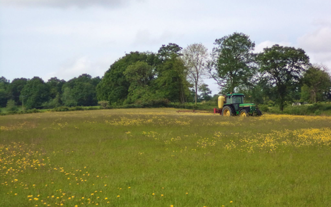 Belsham farming with Tractor-mounted sprayer at United Kingdom