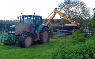 Seggons contractors with Hedge cutter at Loxhore