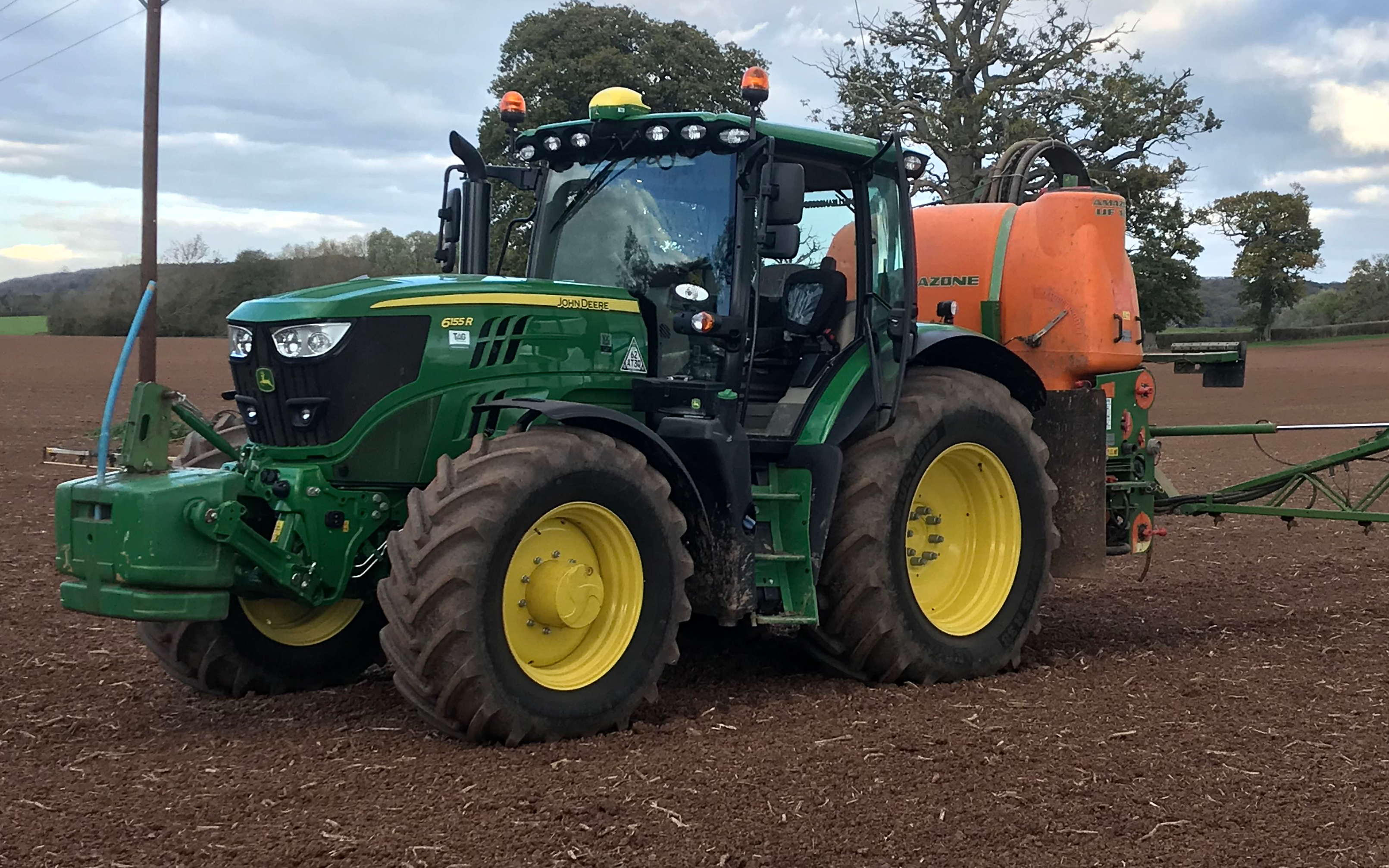 Hill house farm with Tractor-mounted sprayer at Ross Road