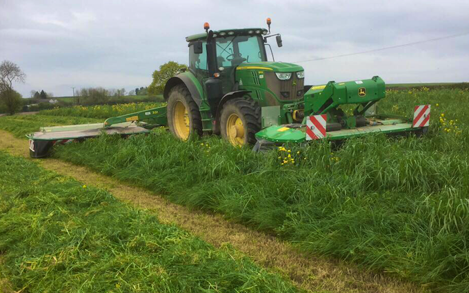 N.r phillips agricultural contracting services  with Mower at Duffryn