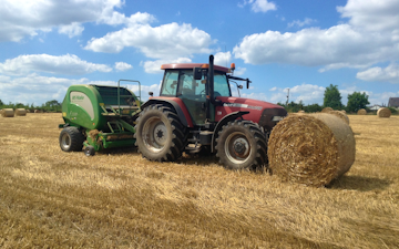 Ejw & me griffiths with Round baler at Crossgates