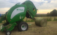 Adam & sons agri services with Round baler at United Kingdom