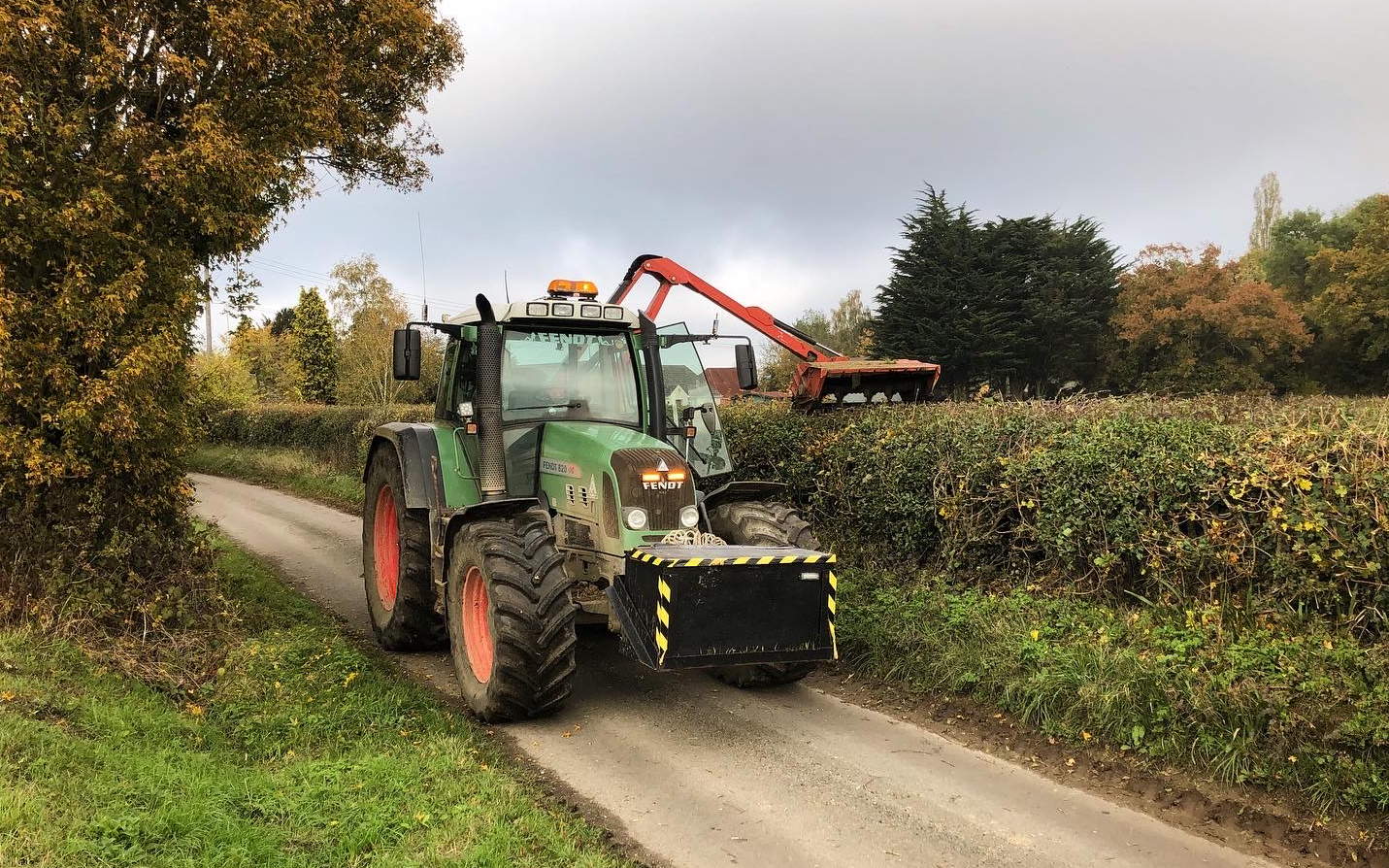 Ad and km caston  with Hedge cutter at Offton