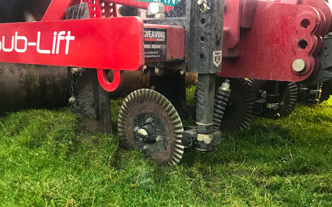 Jr king and son with Meadow aerator at United Kingdom