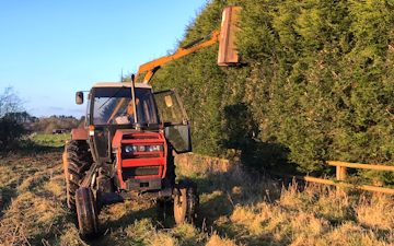 Otg paddock maintenance with Hedge cutter at United Kingdom
