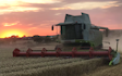 James knight farms with Combine harvester at United Kingdom