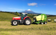 Hinton contracting ltd with Round baler at Stratford