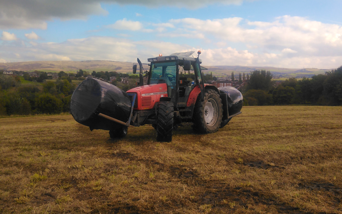 J brierley agricultural with Bale chaser at Rochdale