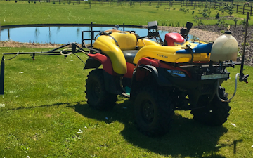 Eds agricultural contracting  with ATV sprayer at Belton
