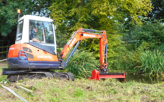 Cru contractors ltd with Hedge cutter at Hadleigh