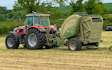 James knight farms with Round baler at United Kingdom