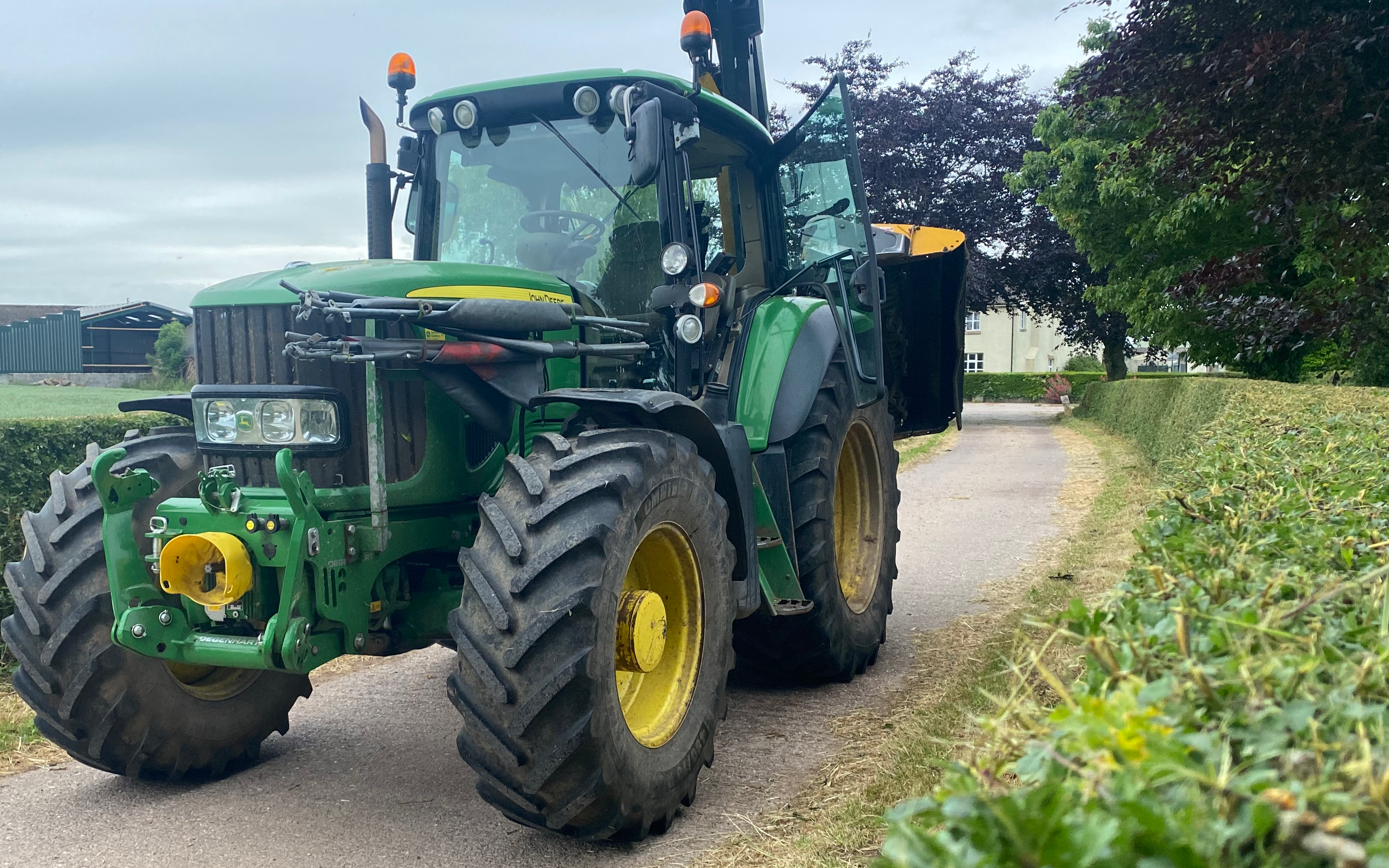 K.r.sharratt agricultural services  with Hedge cutter at Gnosall