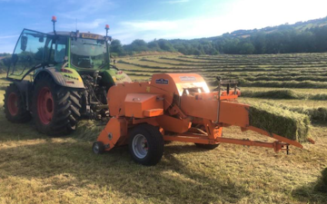 Kaleb cooper contracting ltd with Small square baler at Heythrop