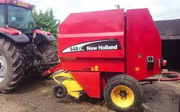 T. bannister and son with Round baler at Barnes Drove