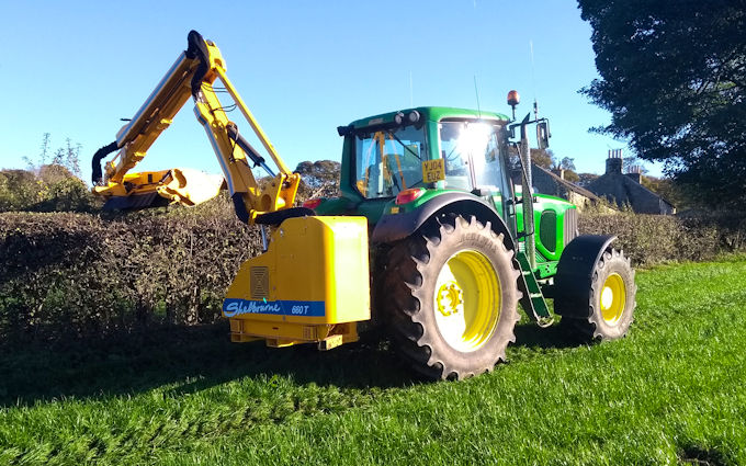 A & sj charlesworth farmers and contractors with Hedge cutter at Loxley