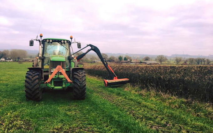 T&b agricultural contractors ltd with Hedge cutter at United Kingdom