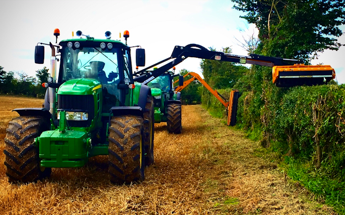 A t contracting with Hedge cutter at United Kingdom