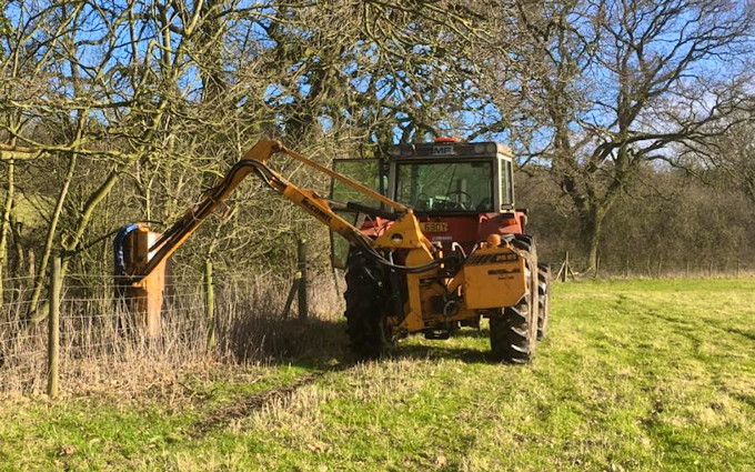 Oxfordshire's agricultural services with Hedge cutter at Boars Hill