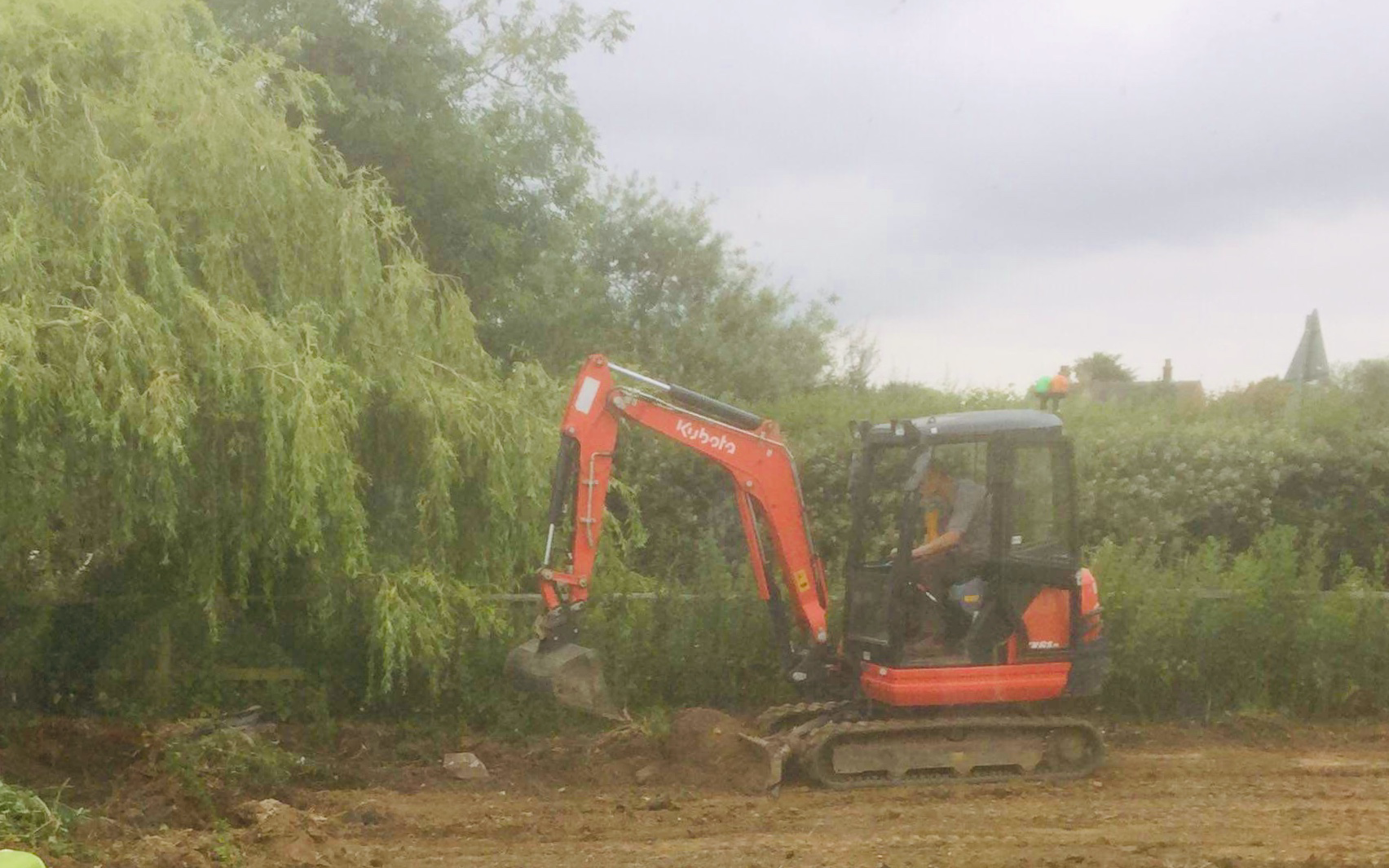 Mh agricultural ltd with Excavator at Cranfield