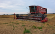 Aldburys farm contracting  with Combine harvester at United Kingdom