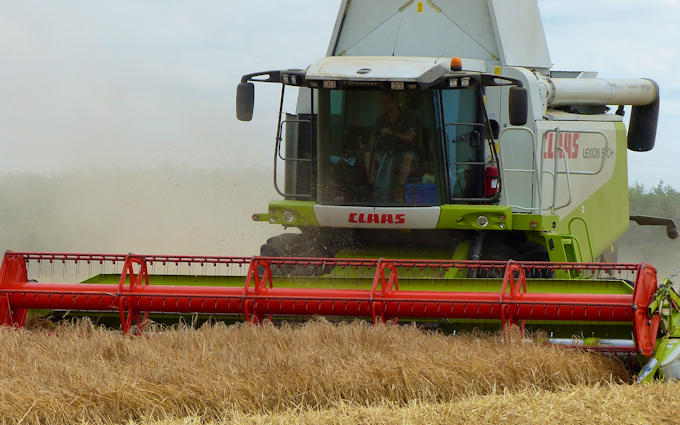 A r belton and son with Combine harvester at Ealand