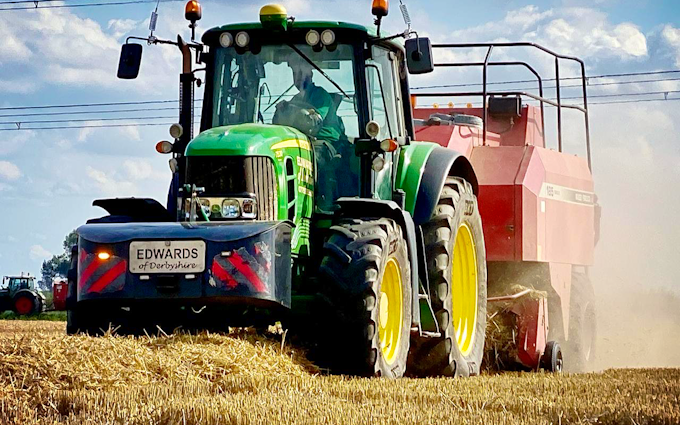 Edwards agricultural contracting with Large square baler at Tibshelf