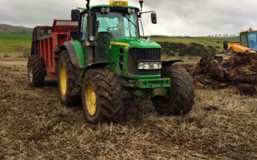 Reid contracting  with Manure/waste spreader at Ballencrieff