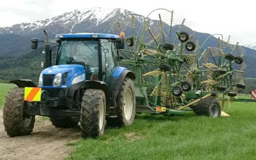 Mid canterbury baling ltd with Rake at Cavendish