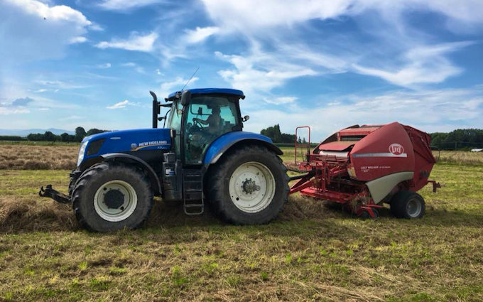 Mckenzie brooker contracting  with Round baler at Oxford