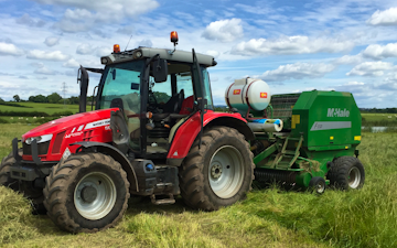East lodge farm services  with Round baler at Fox Lane