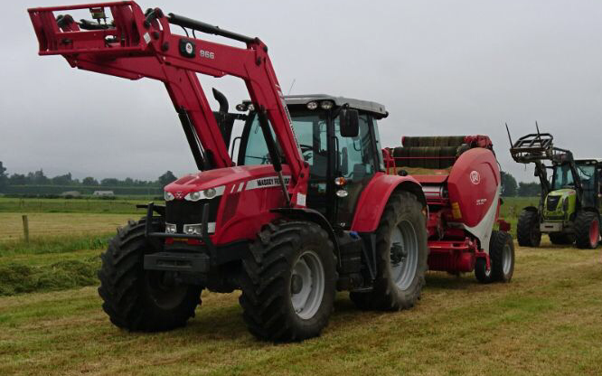 Mid canterbury baling ltd with Round baler at Cavendish