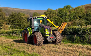 K m bray agri & plant contractor  with Hedge cutter at Talgarth