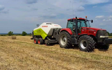 H evans contracting  with Large square baler at Grandborough Fields Road