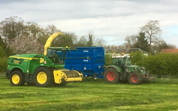 H c beales and co with Forage harvester at Great Ellingham