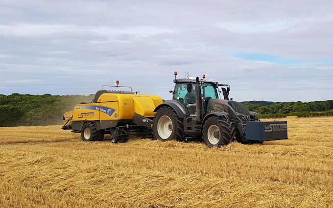 A&s eggleston with Large square baler at United Kingdom