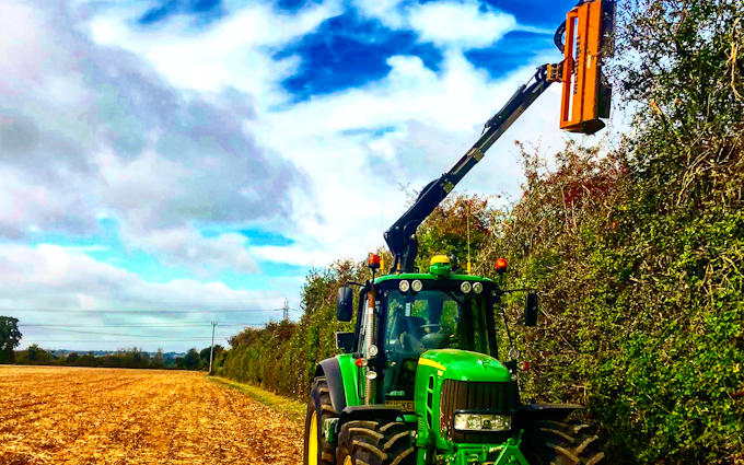 A t contracting with Hedge cutter at United Kingdom
