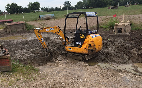 Sas land services  with Mini digger at Winkfield Row