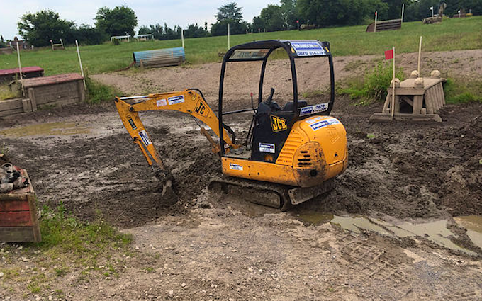 Sas land services  with Mini digger at Winkfield Row