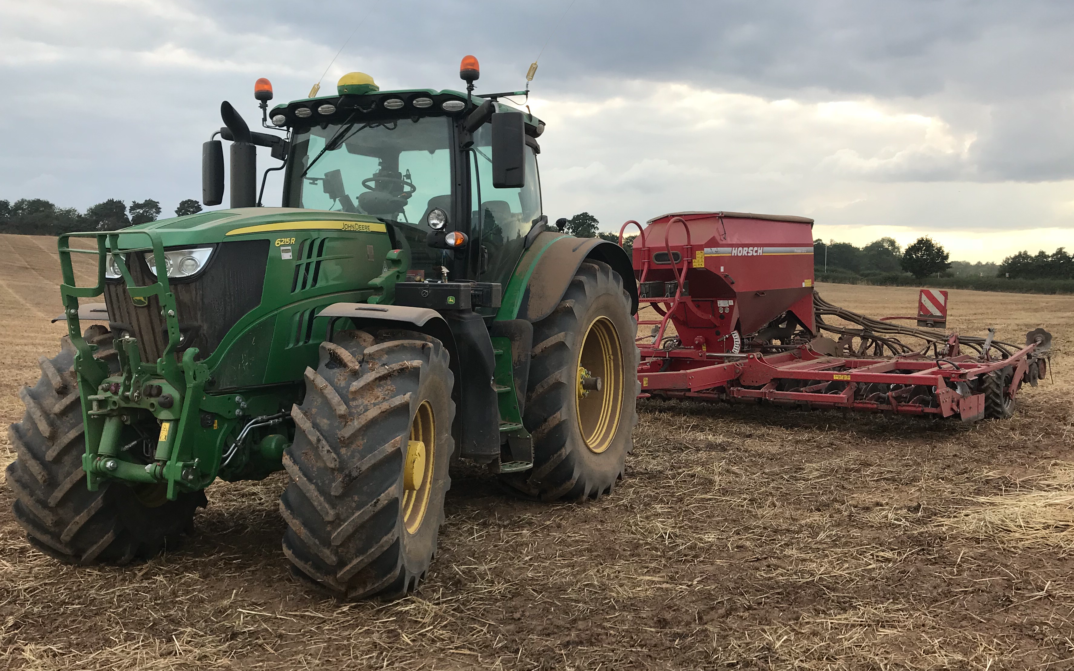 David marshall agricultural contractor with Drill at Albrighton