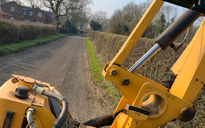 A. farrell contracting with Hedge cutter at United Kingdom