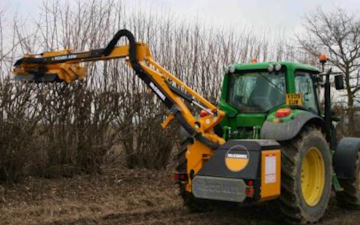 Agri serv with Hedge cutter at Scaftworth