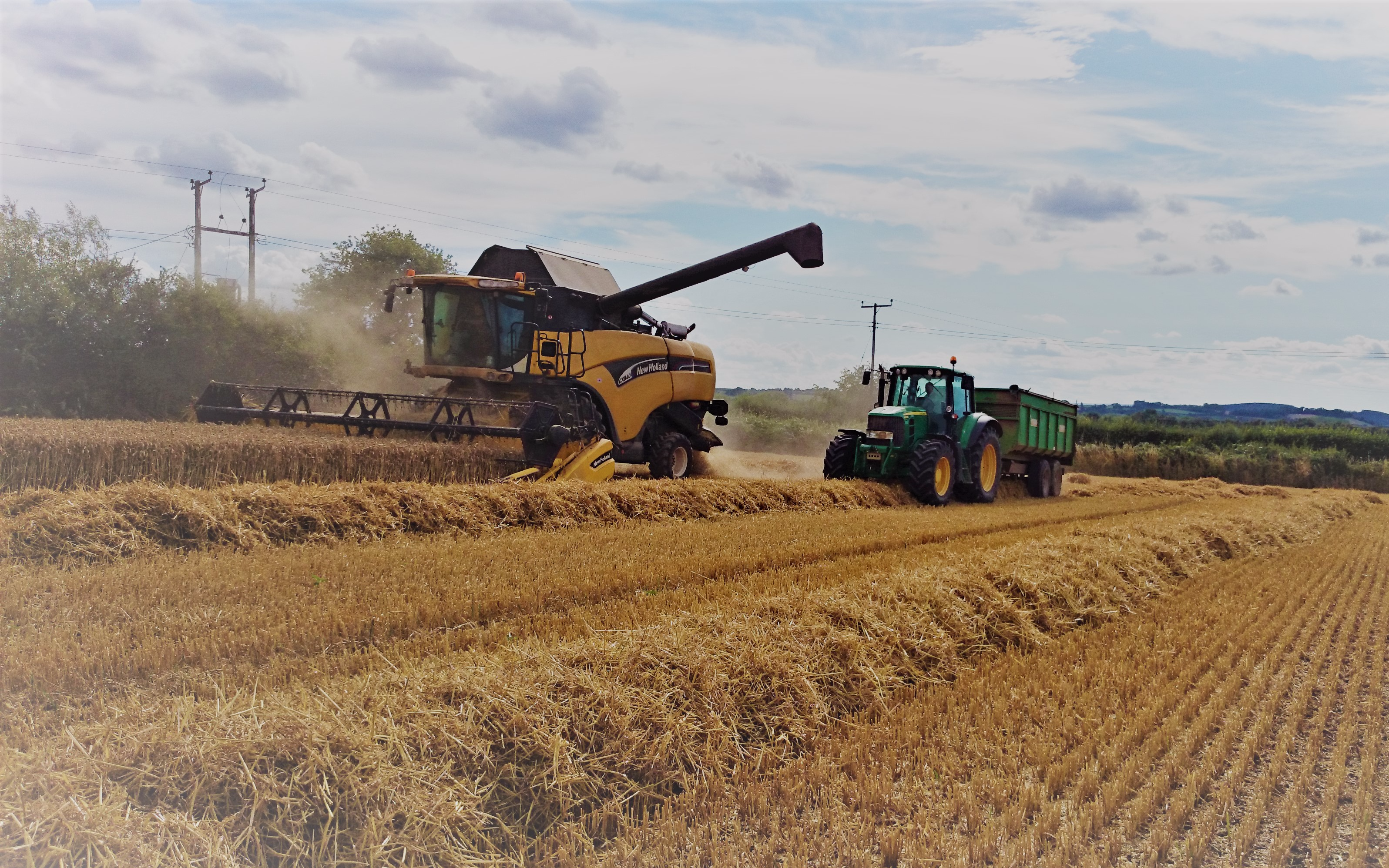 Oakfield contracting with Combine harvester at United Kingdom
