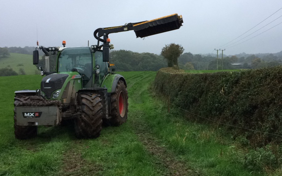 G. lloyd agri services  with Hedge cutter at United Kingdom