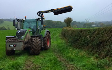 G. lloyd agri services  with Hedge cutter at United Kingdom