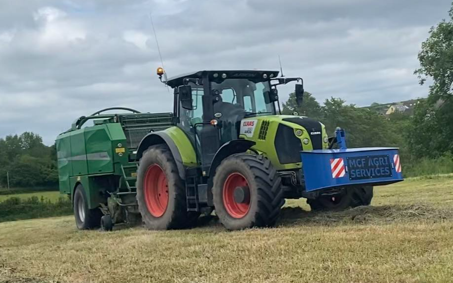 Mcf agri services with Round baler at Kidwelly