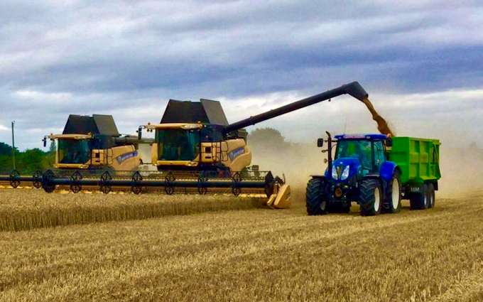 Galloway farms with Combine harvester at United Kingdom