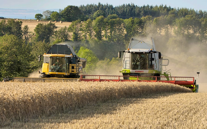 Leslie farm services ltd  with Combine harvester at United Kingdom