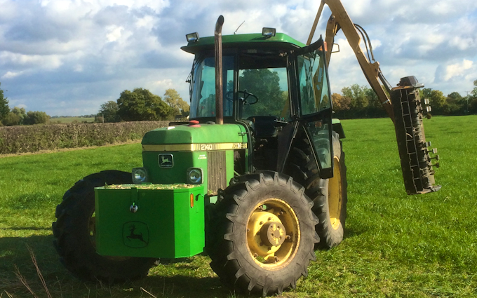 Dominic jeynes agricultural contracting with Hedge cutter at Longdon