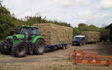 Belsham farming with Flat trailer at United Kingdom