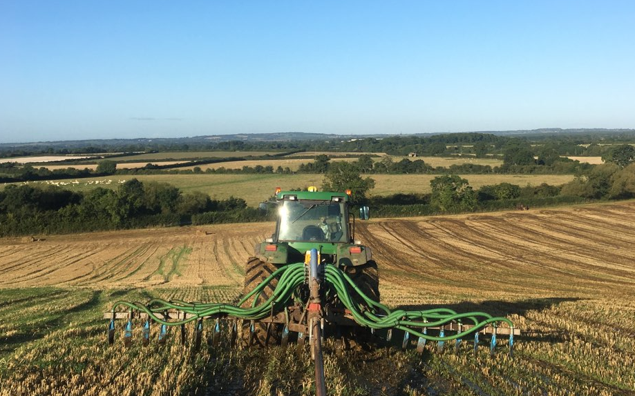 Andy smith agricultural contracting with Slurry spreader/injector at Dinton